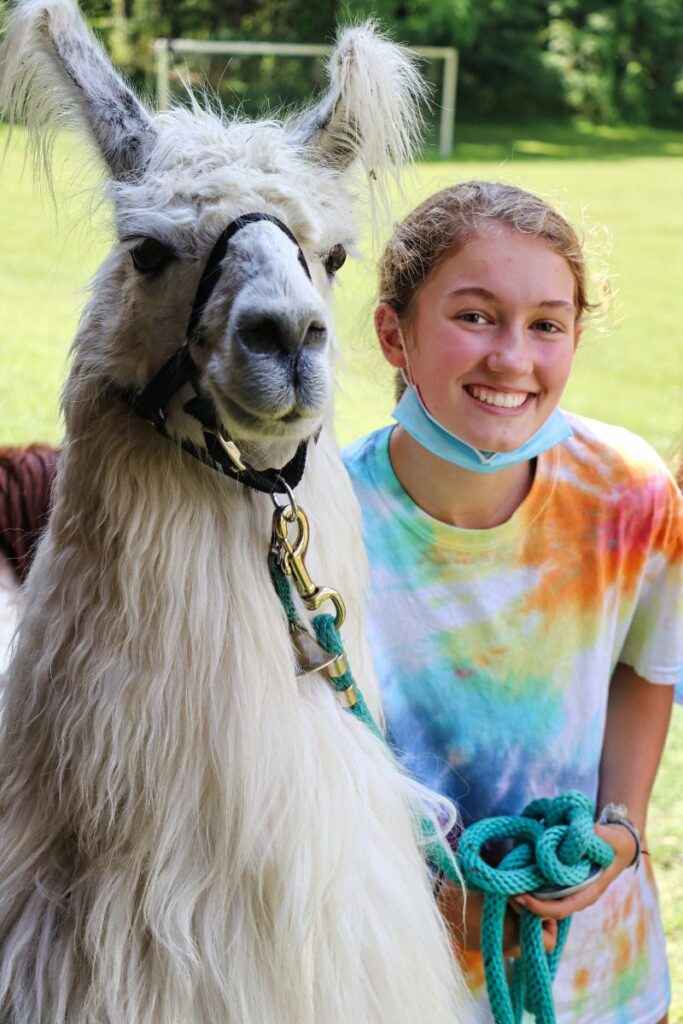 girl with camp lama