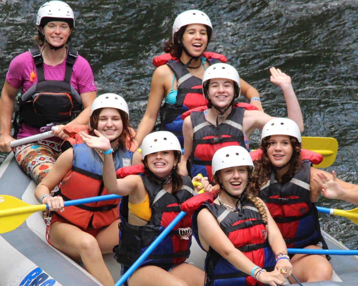 camp girls rafting fun