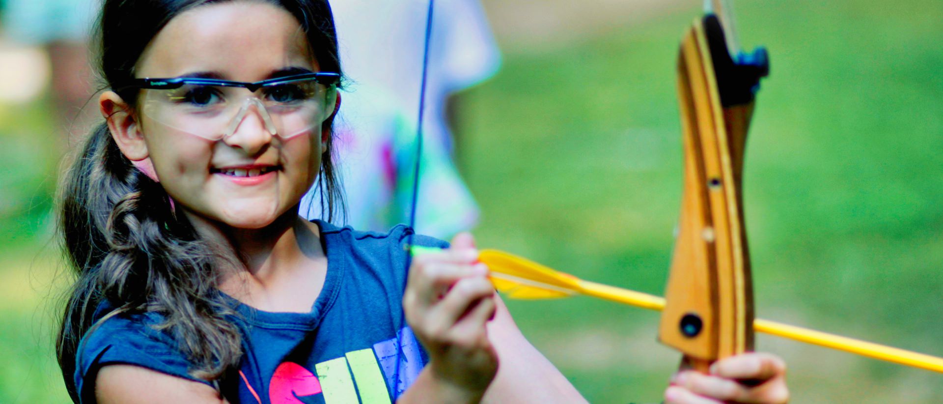 young archer at camp