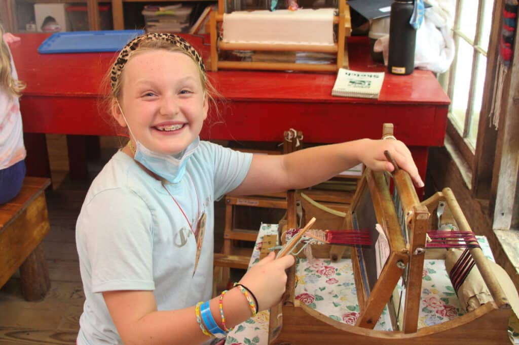 summer camp girl weaving