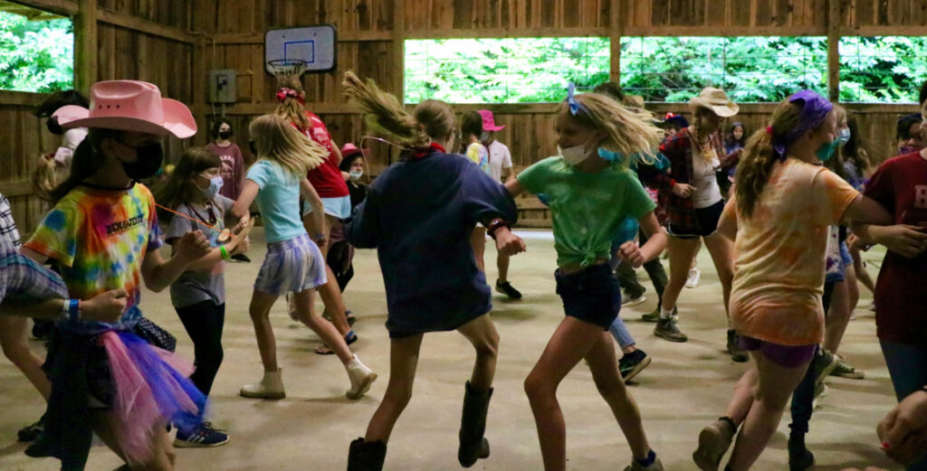 Camp girl square dance