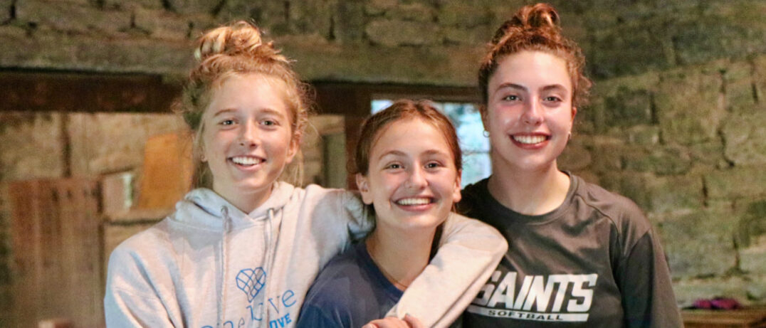 three summer camp girl friends
