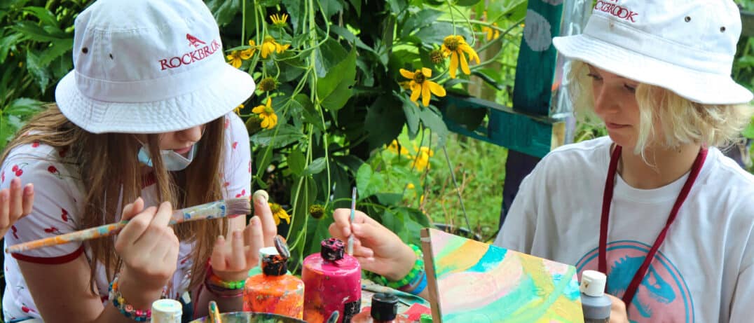 girls doing flower garden art