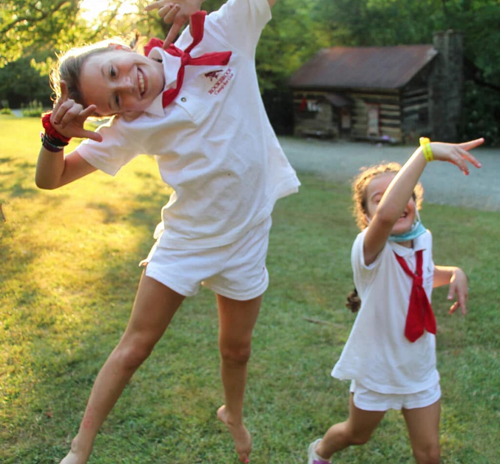 joyful camp kids showing neoteny