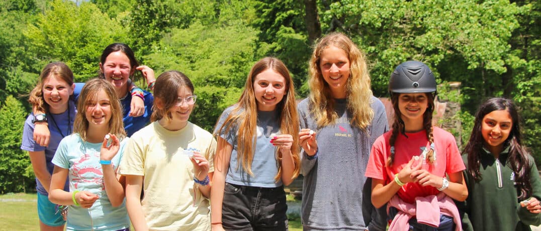 girls awarded bend a back beads at camp