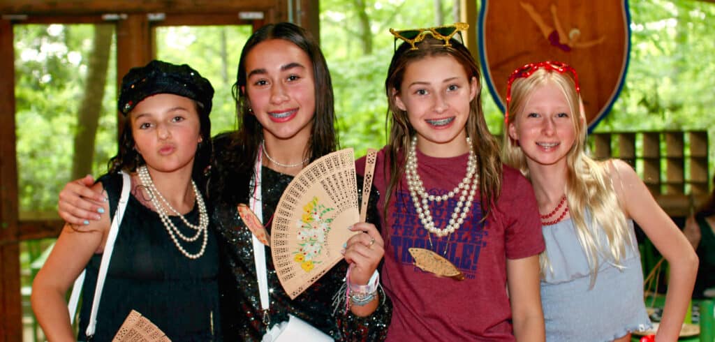 summer camp girls dressed up for red carpet event