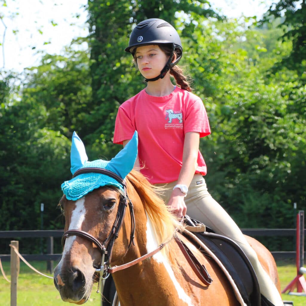 girl riding at horse camp