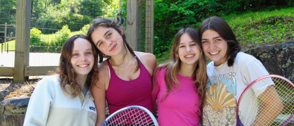 teenage tennis girls at camp