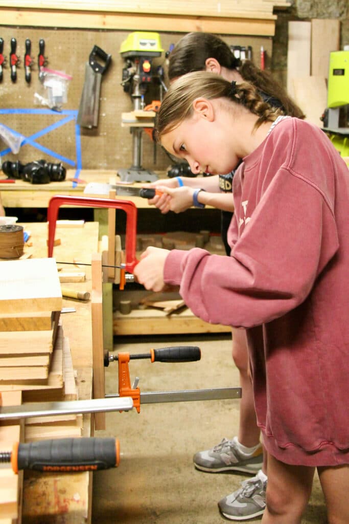 young summer camp woodworker