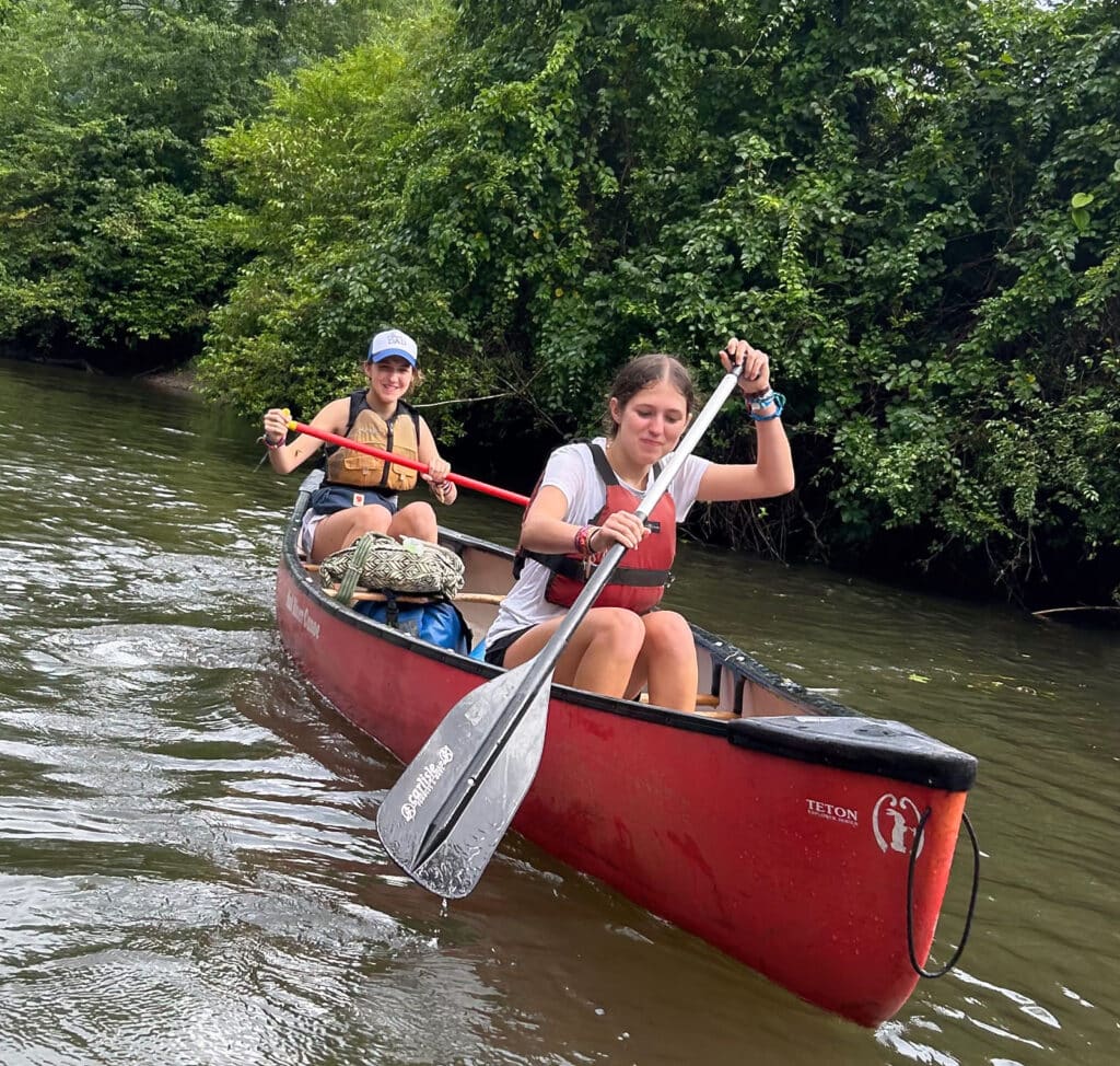 summer camp duo canoeing