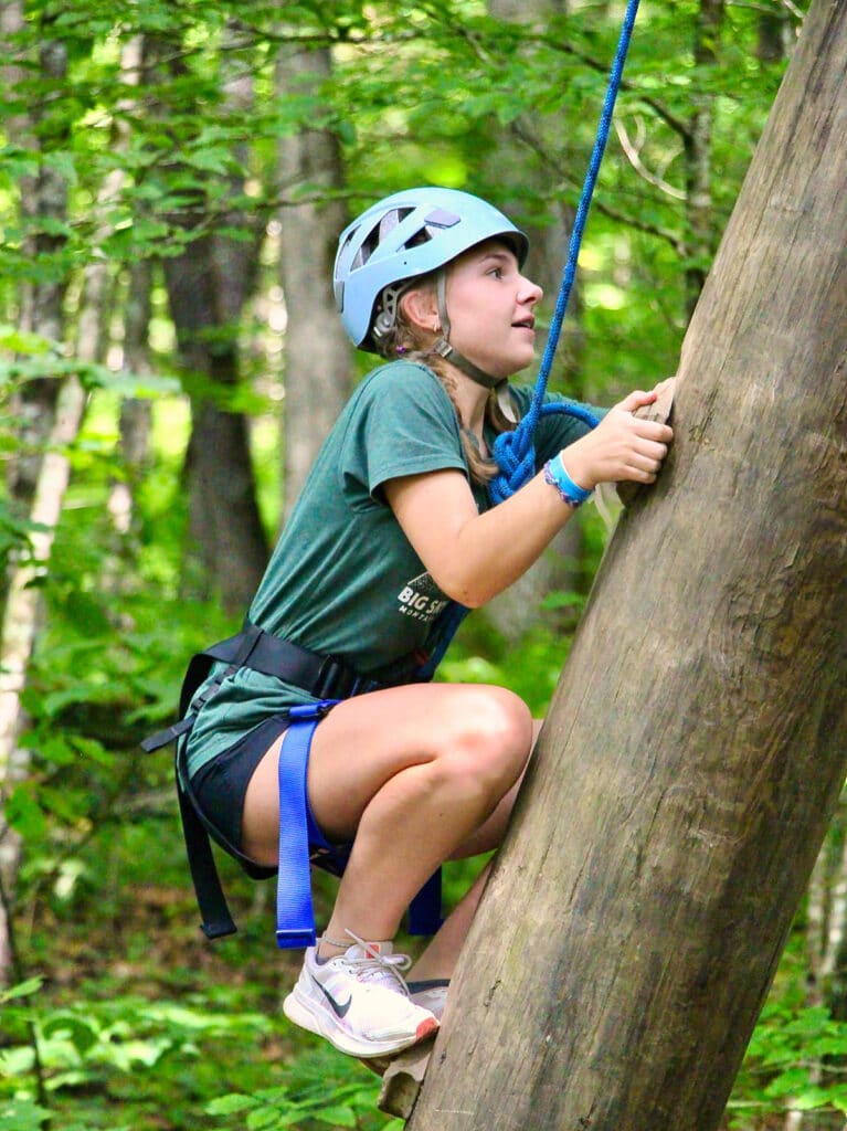 summer camp girl climbing