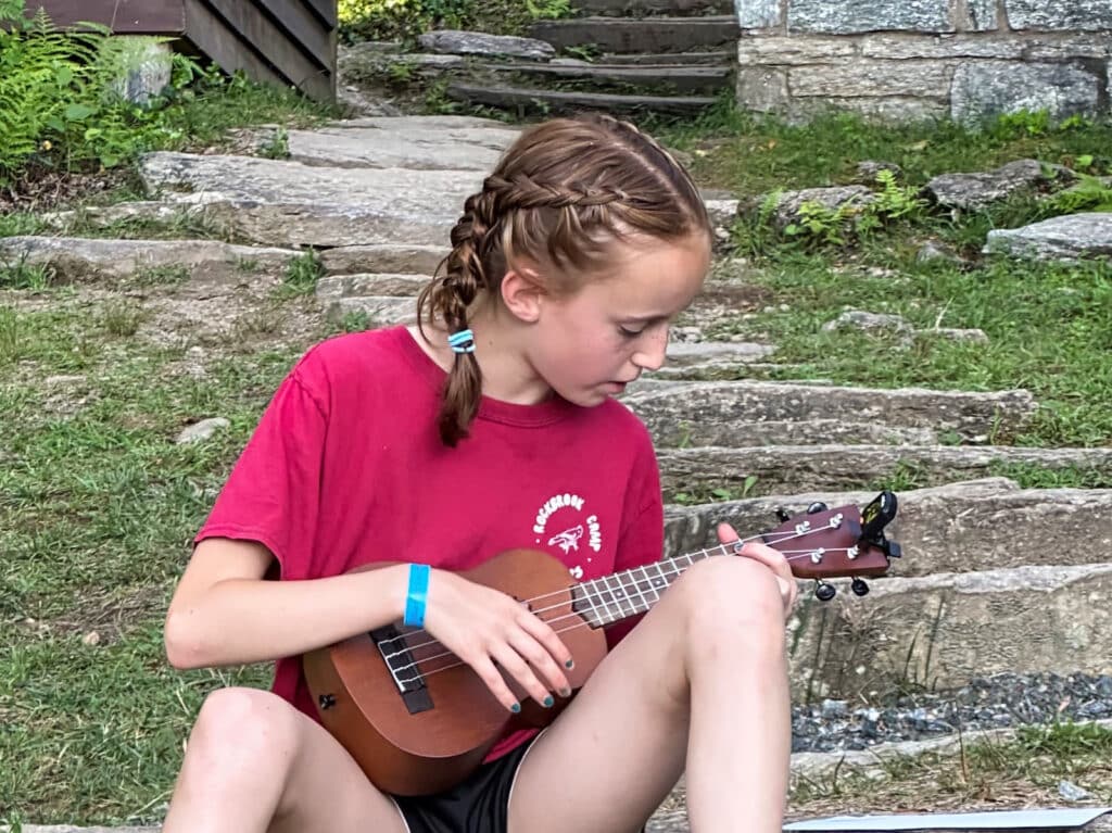 camp ukelele player