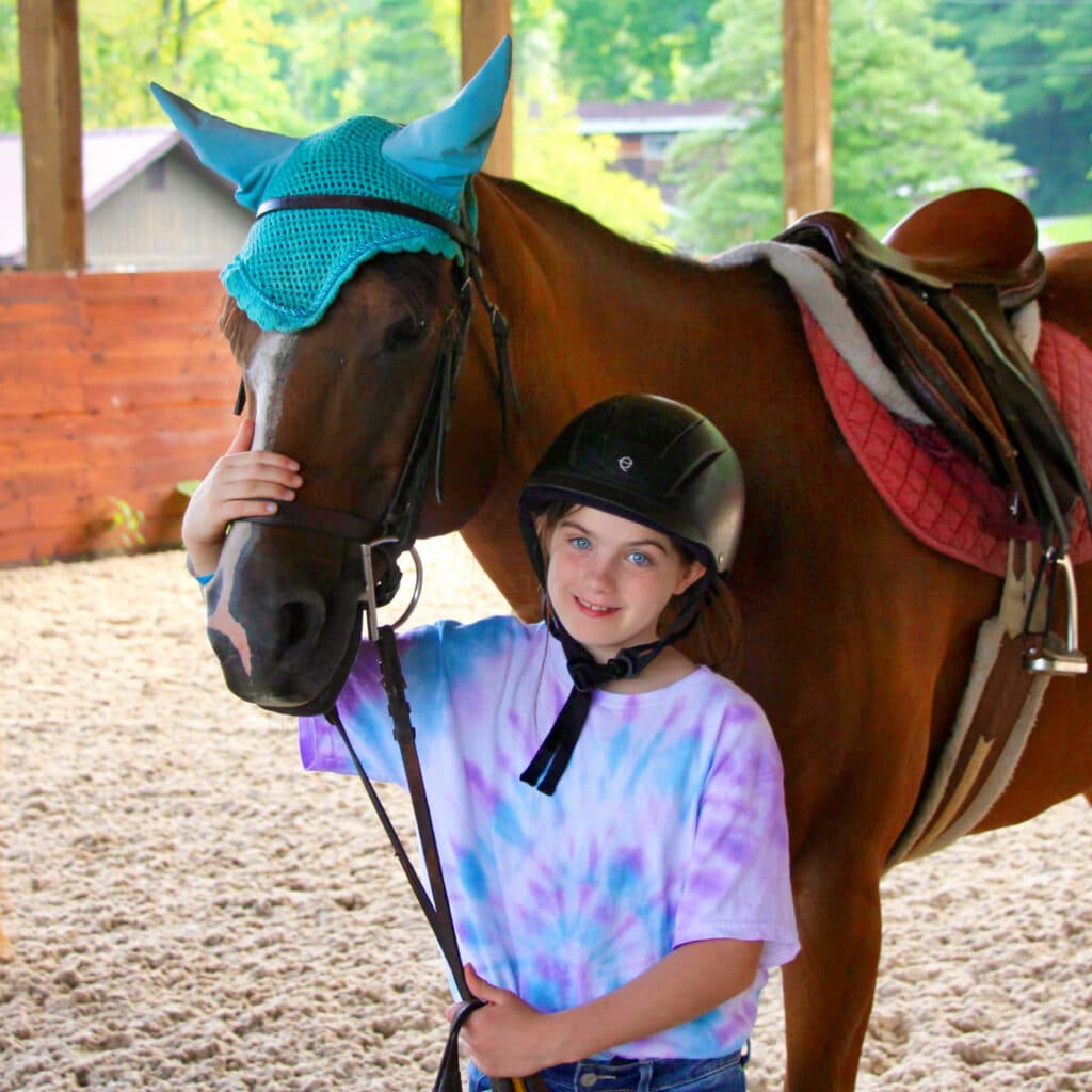 summer camp girl loves horses