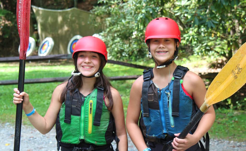 summer camp kayaking girl duo