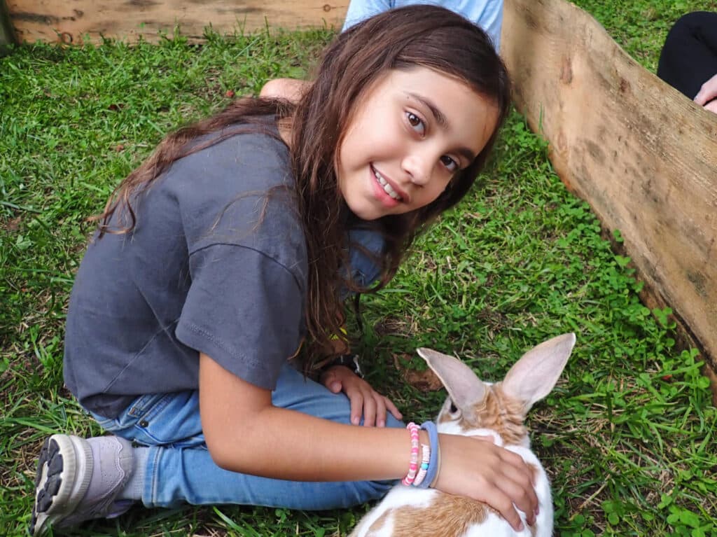 Child with rabbit