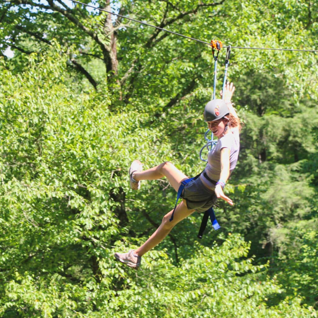 summer camp zip line girl