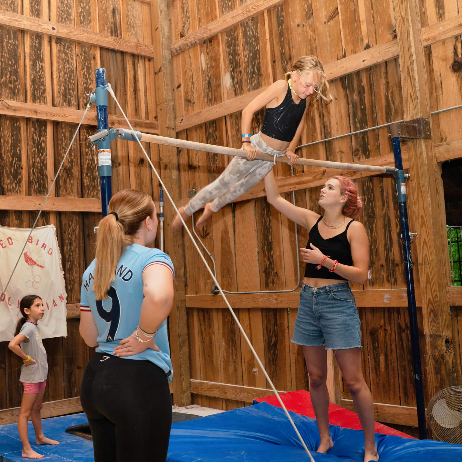 summer camp gymnastics high bar work