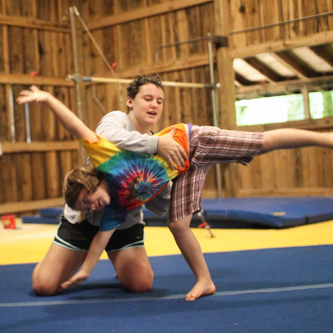 learning a cartwheel at summer camp