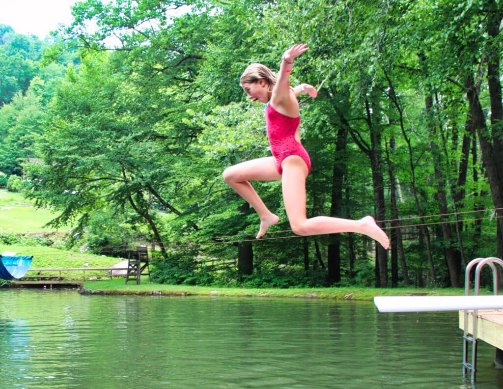 summer camp lake diving board jump