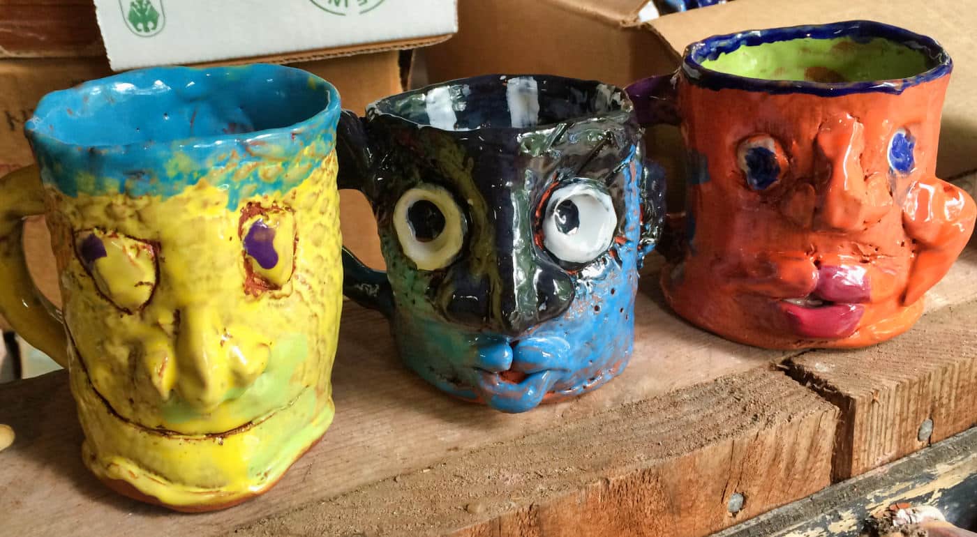 Colorful face mugs