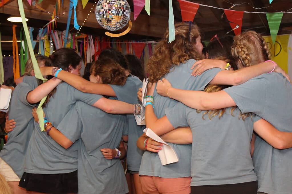 girls summer camp hugs