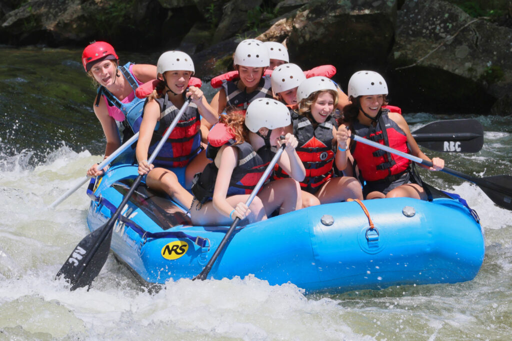 camp girls rafting fun