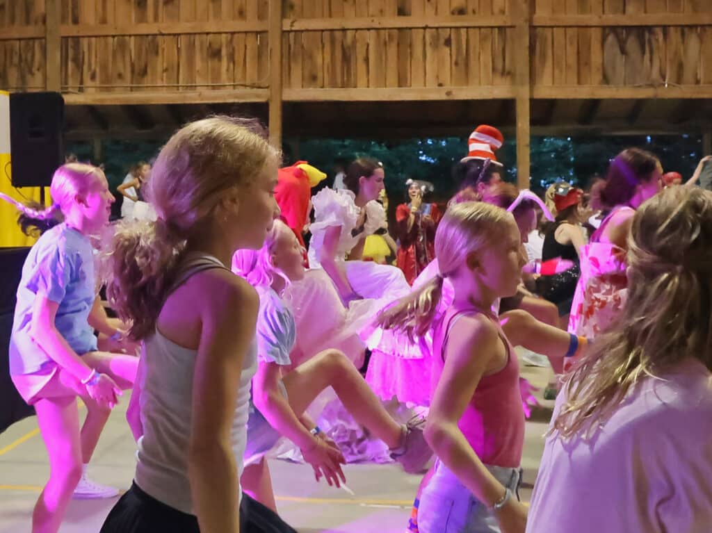 crowd of camp girls dancing